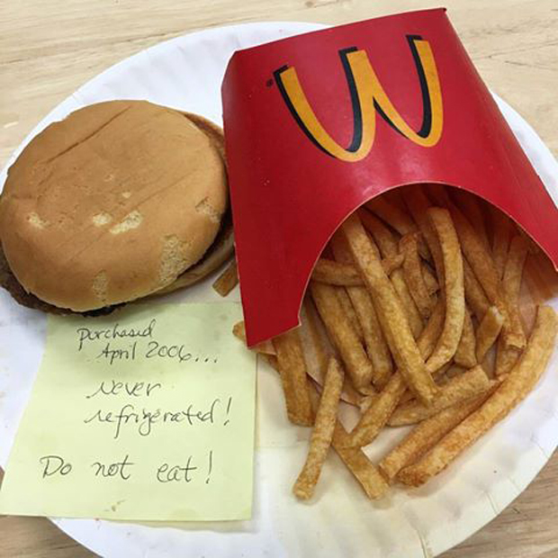 The decade old burger is pictured next to a note saying "do not eat!" Photo / Reddit